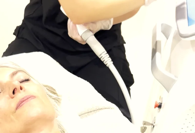 A treatment room at The Hampton Clinic during a skin treatment